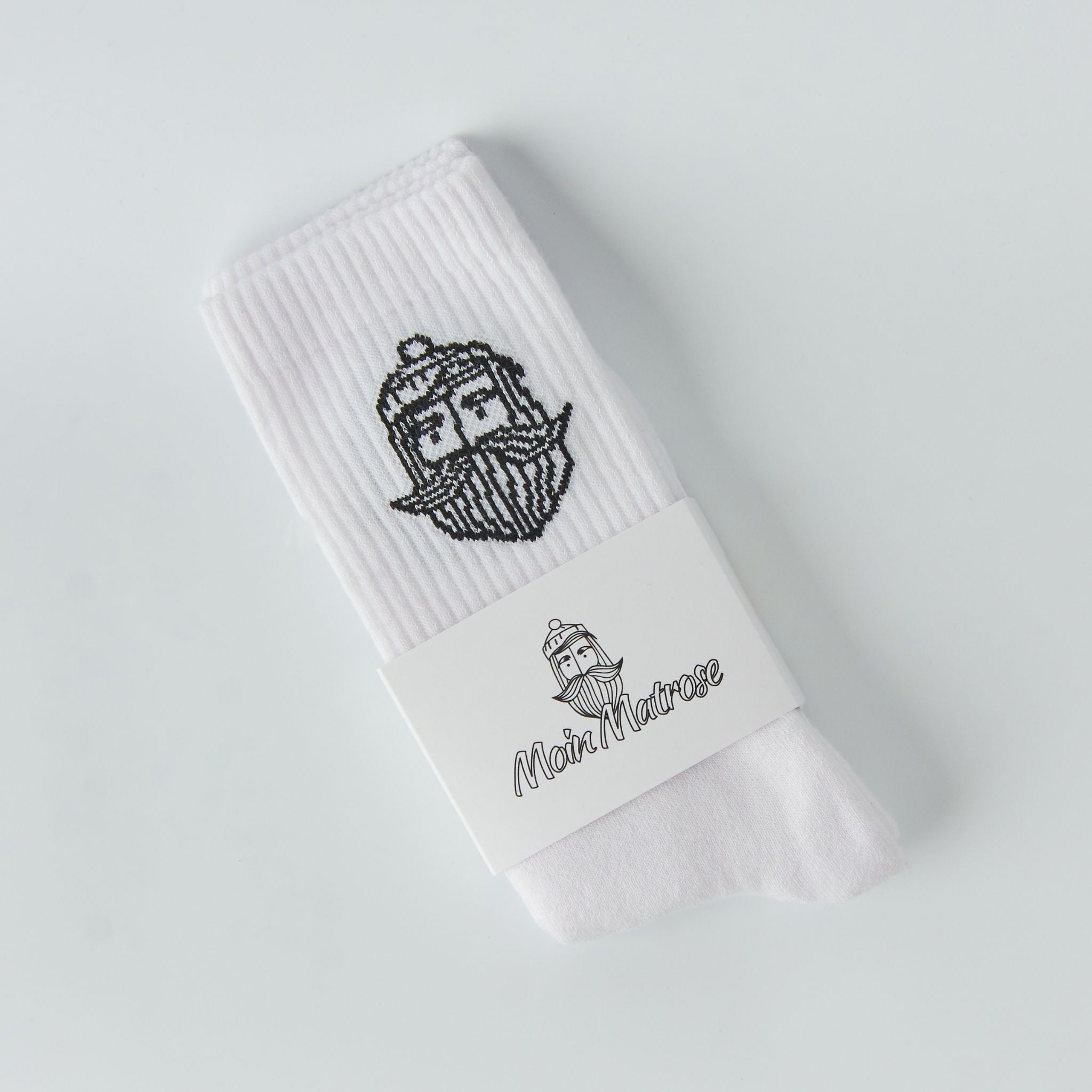 Weiße Fangfrisch Socken in Verpackung mit maritimem Logo „Matrose“