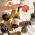 Fangfrisch Weinreise mit verschiedenen Weinen und Korken – Rosé, Weiß, Grau, Rot und Rotspon